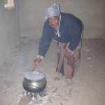 The helper cooking a meal at the NCP