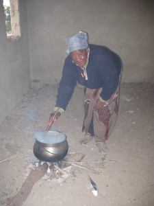 The helper cooking a meal at the NCP